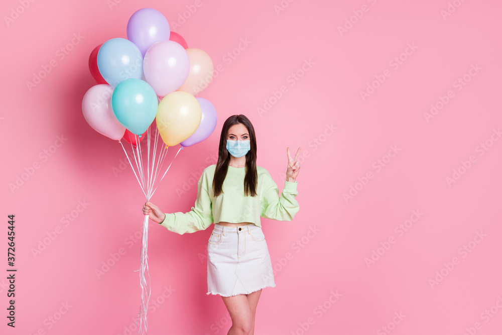 Portrait of her she attractive healthy lovely girl wear safety gauze mask showing v-sign stop pandemia influenza mers cov stay home contamination prevention isolated pink pastel color background Portrait of her she attractive healthy lovely girl wear safety gauze mask showing v-sign stop pandemia influenza mers cov stay home contamination prevention isolated pink pastel color background