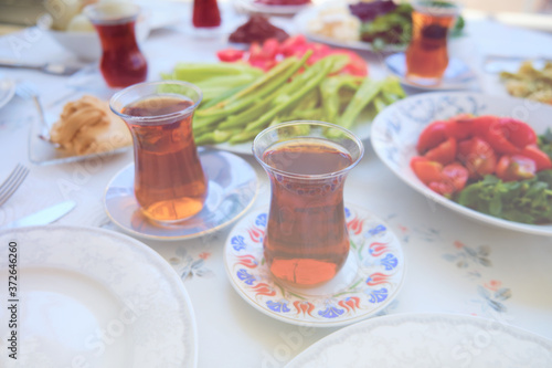 Turkish tea and breakfast on table in the morning