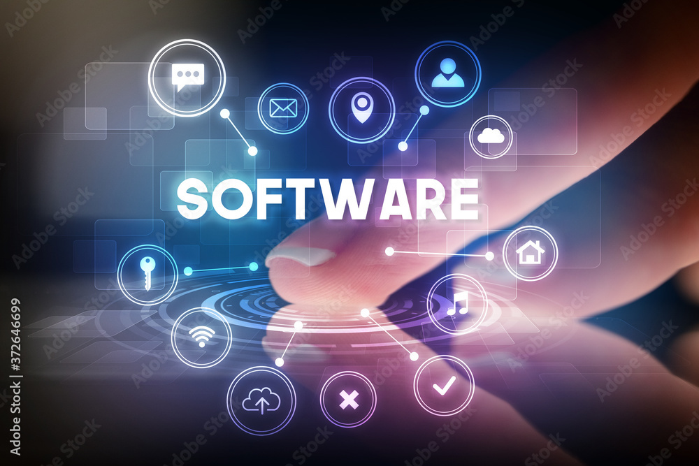 Finger touching tablet with web technology icons and SOFTWARE inscription, web technology concept Finger touching tablet with web technology icons and SOFTWARE inscription, web technology concept