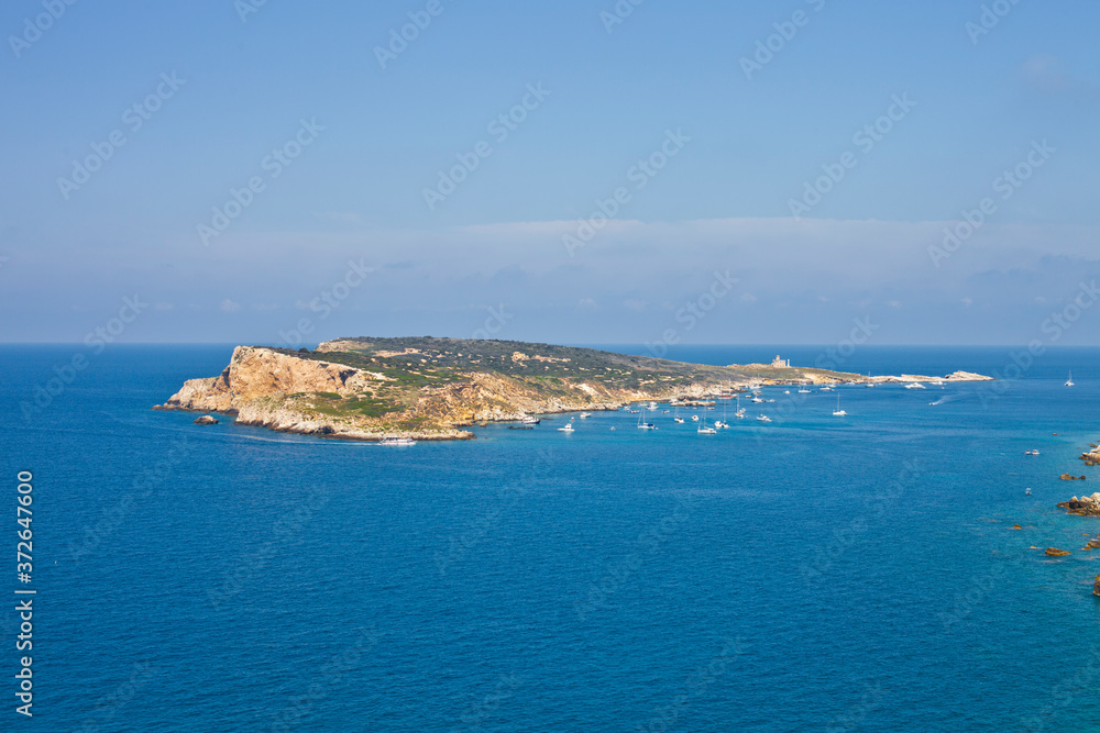Capraia Island, Italy: scenic view of tipycal rocky coastline. Adriatic Sea. Puglia, Italy.