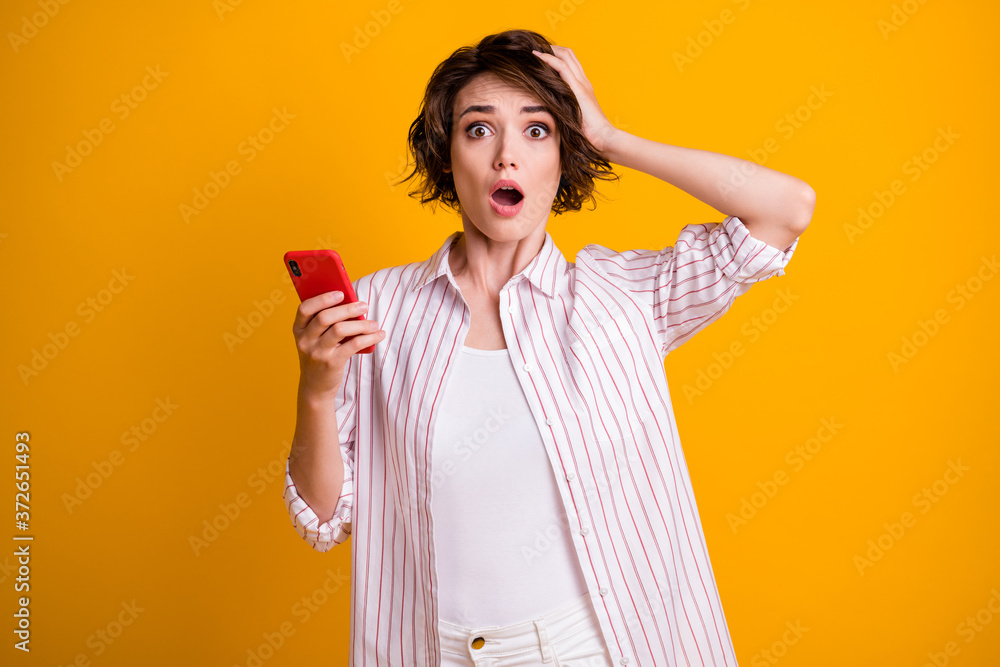 Photo of astonished frustrated girl use cellphone impressed social network small followers subscribers touch hand head wear good look outfit isolated bright shine color background Photo of astonished frustrated girl use cellphone impressed social network small followers subscribers touch hand head wear good look outfit isolated bright shine color background