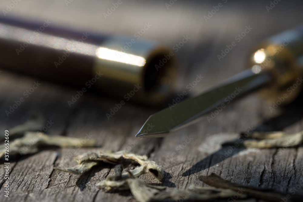 custom made wallpaper toronto digitalTea knife close-up on a wooden table.