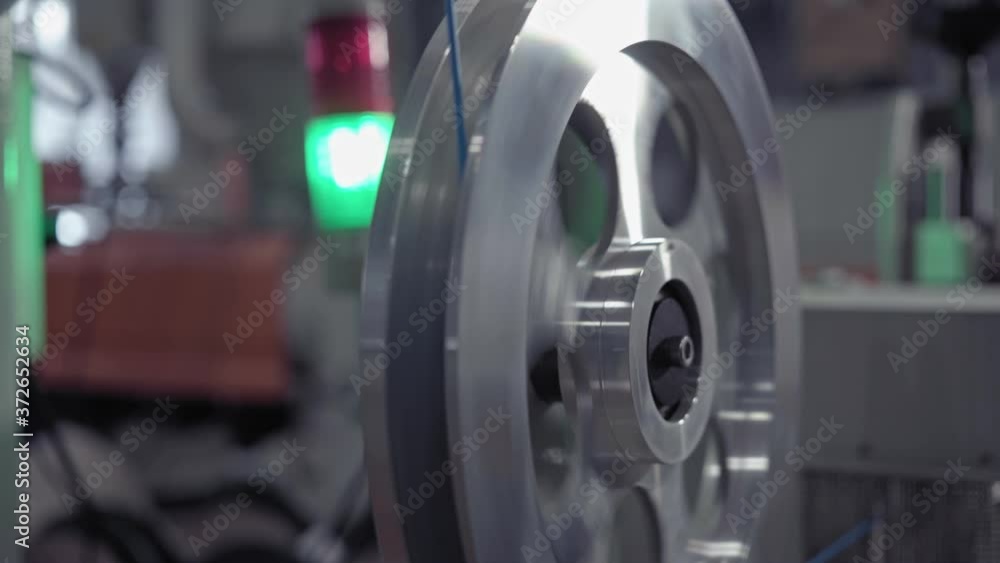 Clodeup Coils of copper cable reels wire industry. Modern cable factory. Production of cable. Indoor, conveyor. Clodeup Coils of copper cable reels wire industry. Modern cable factory. Production of cable. Indoor, conveyor.