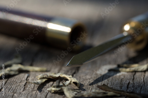 Wallpaper Mural Tea knife close-up on a wooden table. Torontodigital.ca