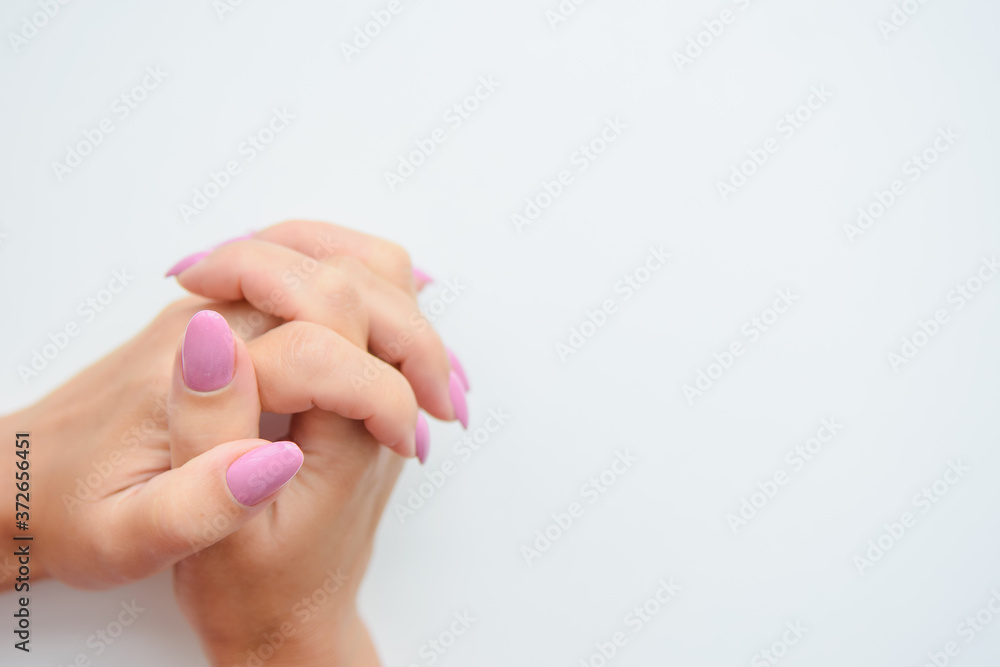 Women's hands isolated on a white background. Close up. Women's hands isolated on a white background. Close up.