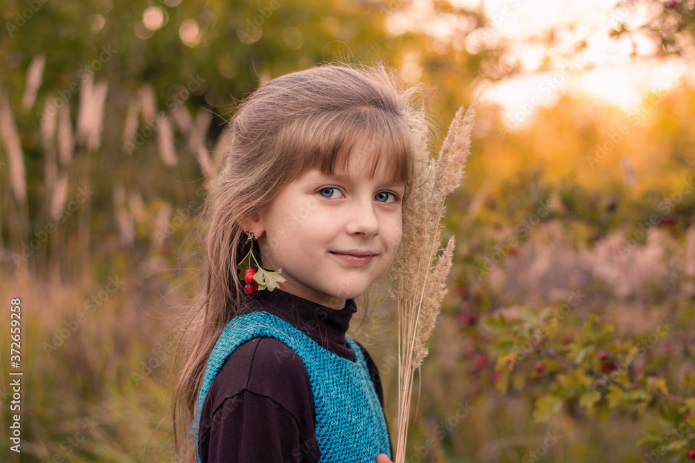 little girl in autumn park. portrait of a little girl in autumn park little girl in autumn park. portrait of a little girl in autumn park