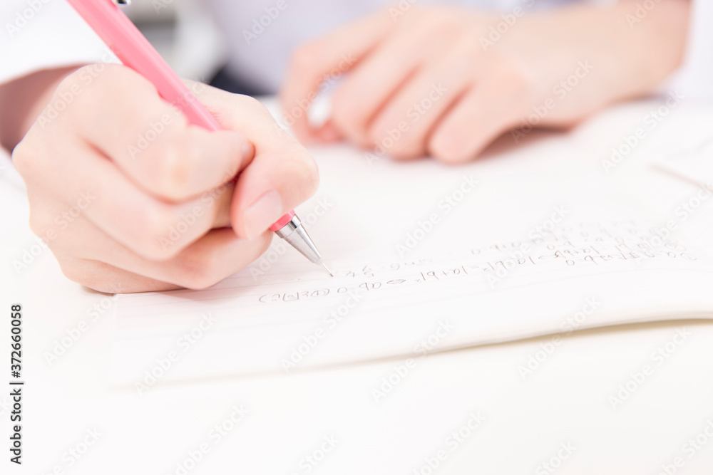 勉強する女子高校生の手元 Stock Photo Adobe Stock