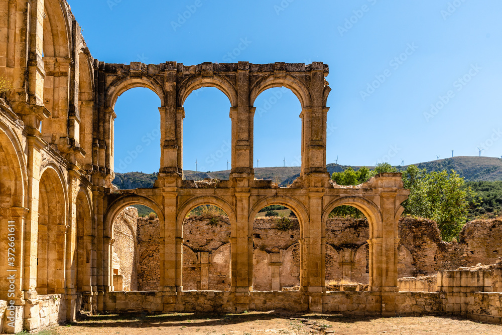 Fototapeta premium View of the ruins of an ancient abandoned monastery in Santa Maria de Rioseco, Burgos, Spain