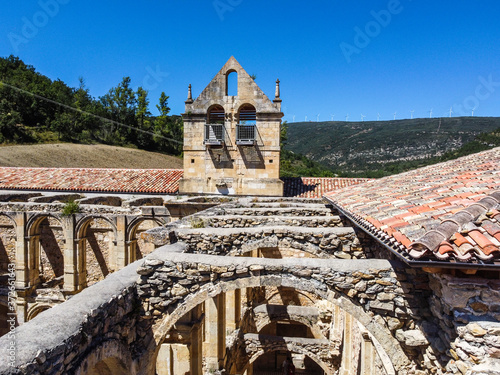 Aerial view of the ruins of an ancient abandoned monastery in Santa Maria de rioseco, Burgos, Spain. photo