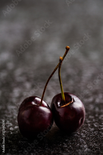 Two cherries on the table © Jenni Hietanen