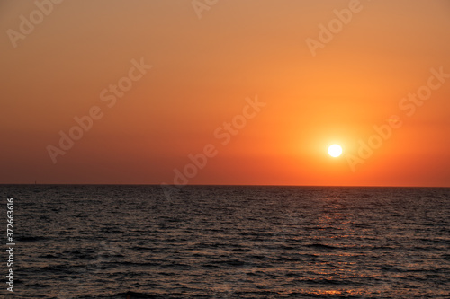 Sunset from the beautiful beach of Santa Marinella, close to Rome, Italy   © lucazzitto