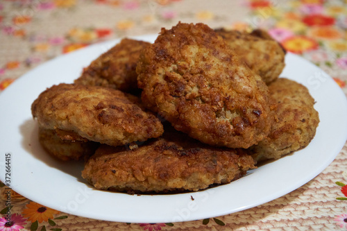 cutlets on a white plate,appetizing juicy cutlets on the table in a plate