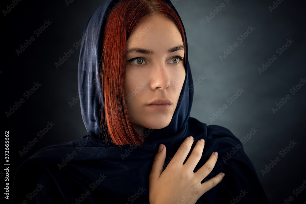 Young woman wearing hijab on black. Young woman wearing hijab on black.