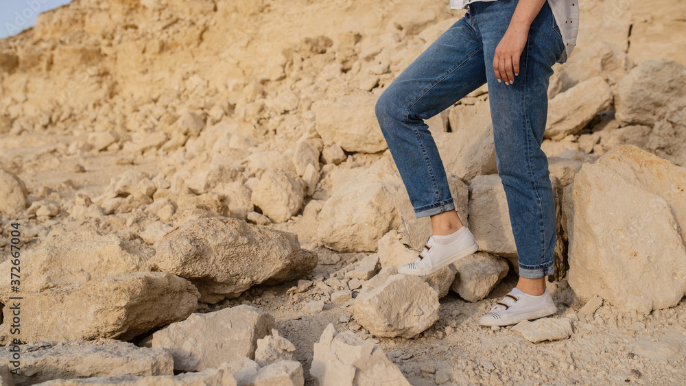 Close up legs on the rocks in the mountain. Close up legs on the rocks in the mountain.