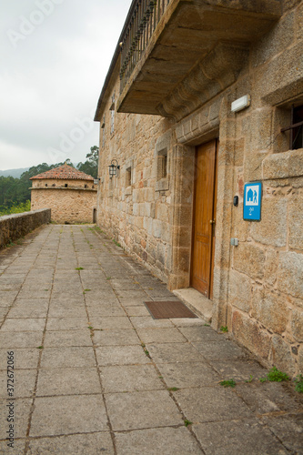 2 nd category hostel banner in Moraime monastery in Galicia photo