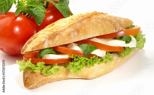 Baguette with Tomato and Mozzarella on white Background - Isolated
