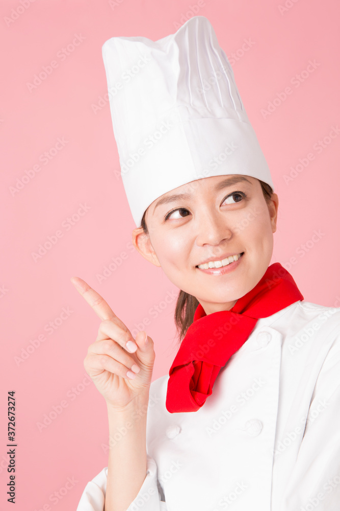 指差しするパティシエ 指差しするパティシエ