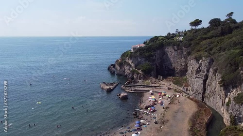 Grosseto, Maremma, Tuscany, Italy. Etruscan cut in Ansedonia, Maremma Toscana. Wide shot and aerial view of mountain, natural rock. Tuscanian sea photo