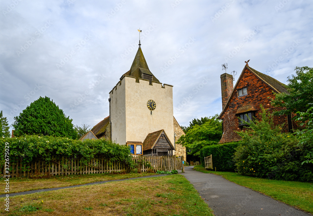 St Bartholomew's Church in Otford, Kent, UK. The church has a square tower with a clock and spire. The Church of St Bartholomew in Otford is a grade 1 listed building. St Bartholomew's Church in Otford, Kent, UK. The church has a square tower with a clock and spire. The Church of St Bartholomew in Otford is a grade 1 listed building.