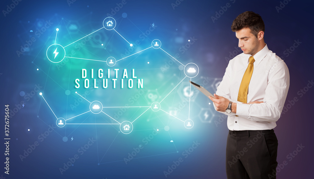 Businessman in front of cloud service icons with DIGITAL SOLUTION inscription, modern technology concept Businessman in front of cloud service icons with DIGITAL SOLUTION inscription, modern technology concept