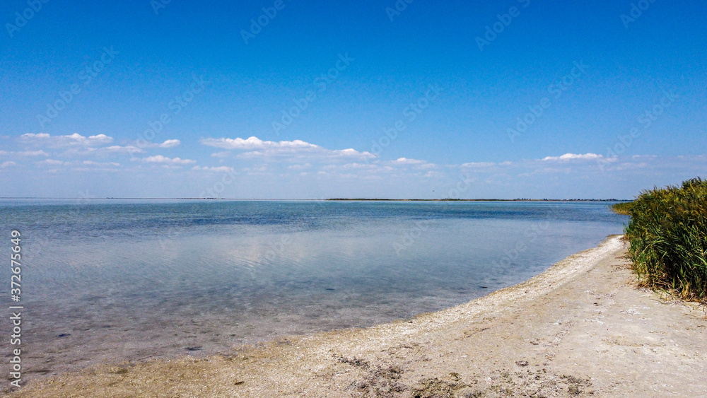 Top view of a beautiful lake with blue transparent water Top view of a beautiful lake with blue transparent water