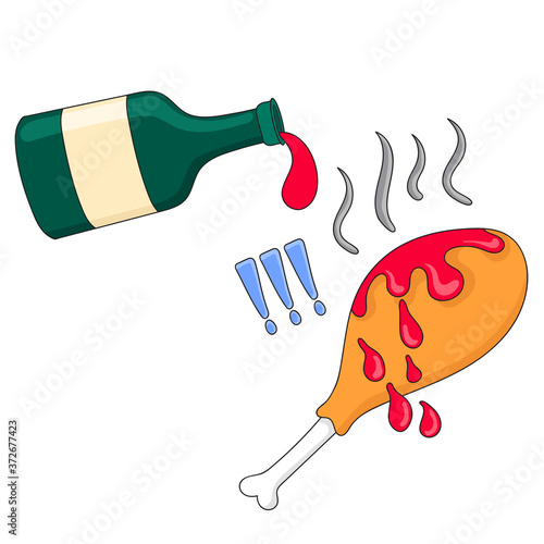 the fried chicken is poured over the sauce from the bottle