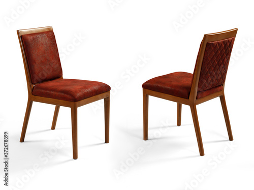 Two comfortable brown dining chairs on a white background