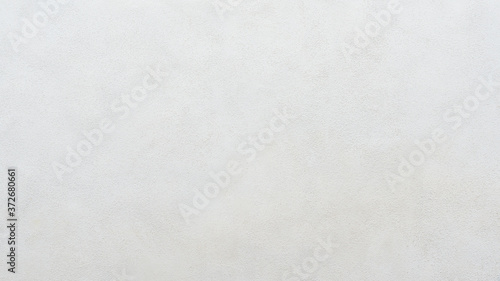 White plastered concrete wall background or texture