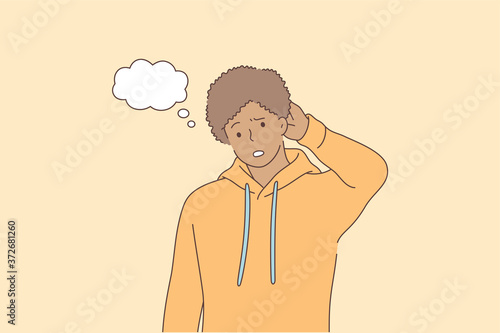 Emotion, face, expression, thought, trouble, question concept. Young pensive thoughtful african american man guy teenager character confused wonder about problem. Uncertainty with doubts or thinking.