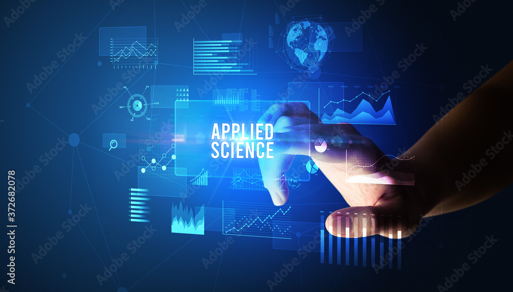 Hand touching APPLIED SCIENCE inscription, new business technology concept Hand touching APPLIED SCIENCE inscription, new business technology concept
