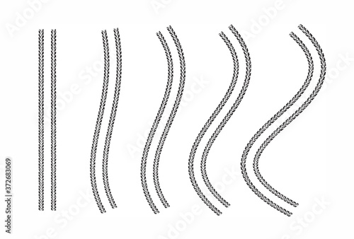 Tire tracks vector set design elements with varying degrees of curvature.