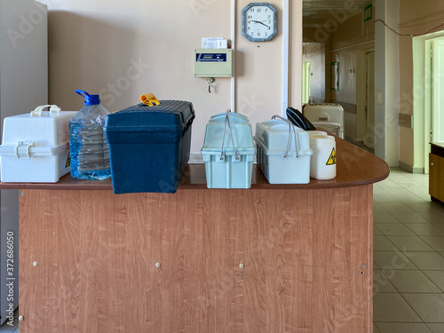 Oryol, Russia - August , 2020. Medical containers for carrying tests at the hospital reception photo
