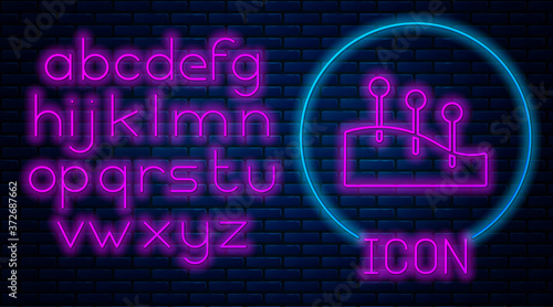 Glowing neon Acupuncture therapy icon isolated on brick wall background. Chinese medicine. Holistic pain management treatments. Neon light alphabet. Vector.
