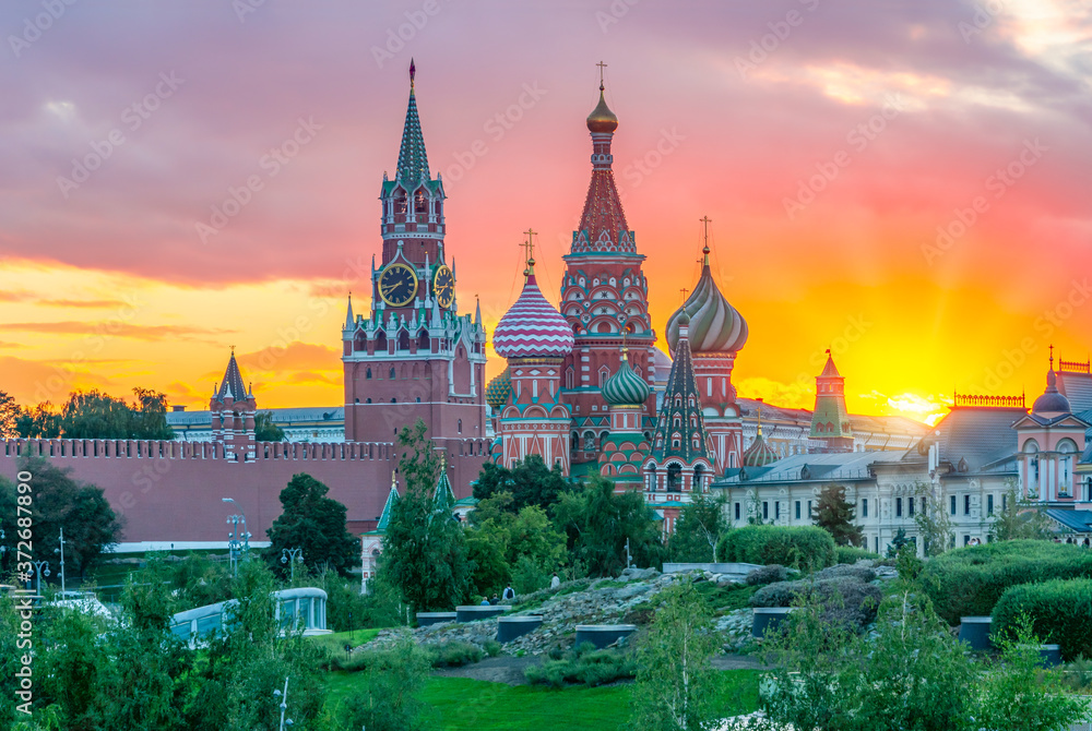 Cathedral of Vasily the Blessed (Saint Basil's Cathedral) and Spasskaya Tower of Moscow Kremlin on Red Square at sunset, Moscow, Russia