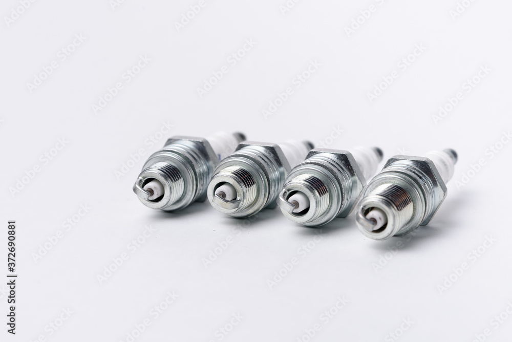 Car spark plugs on white background Car spark plugs on white background