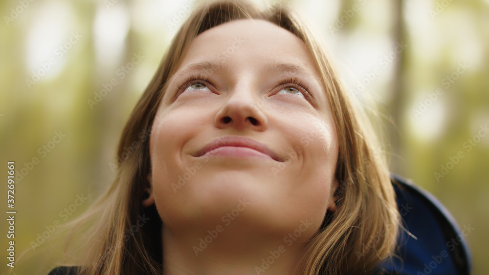Natural beauty. Young woman with green eyes and toothy smile with no make up in the nature. High quality photo Natural beauty. Young woman with green eyes and toothy smile with no make up in the nature. High quality photo