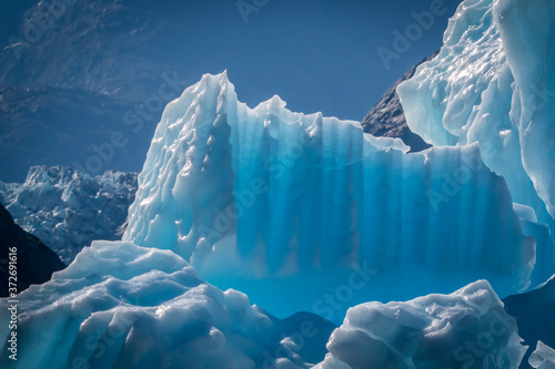 Beautiful blue icebergs calved from glaciers in Alaska, USA. photo