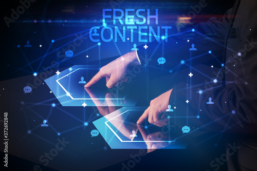 Navigating social networking with FRESH CONTENT inscription, new media concept