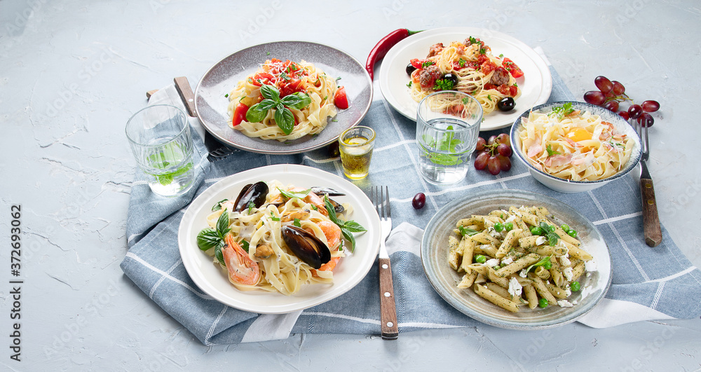 Plates of pastas with different kinds of sauces. Plates of pastas with different kinds of sauces.