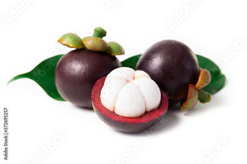 Fresh ripe mangosteen isolated on white background. photo