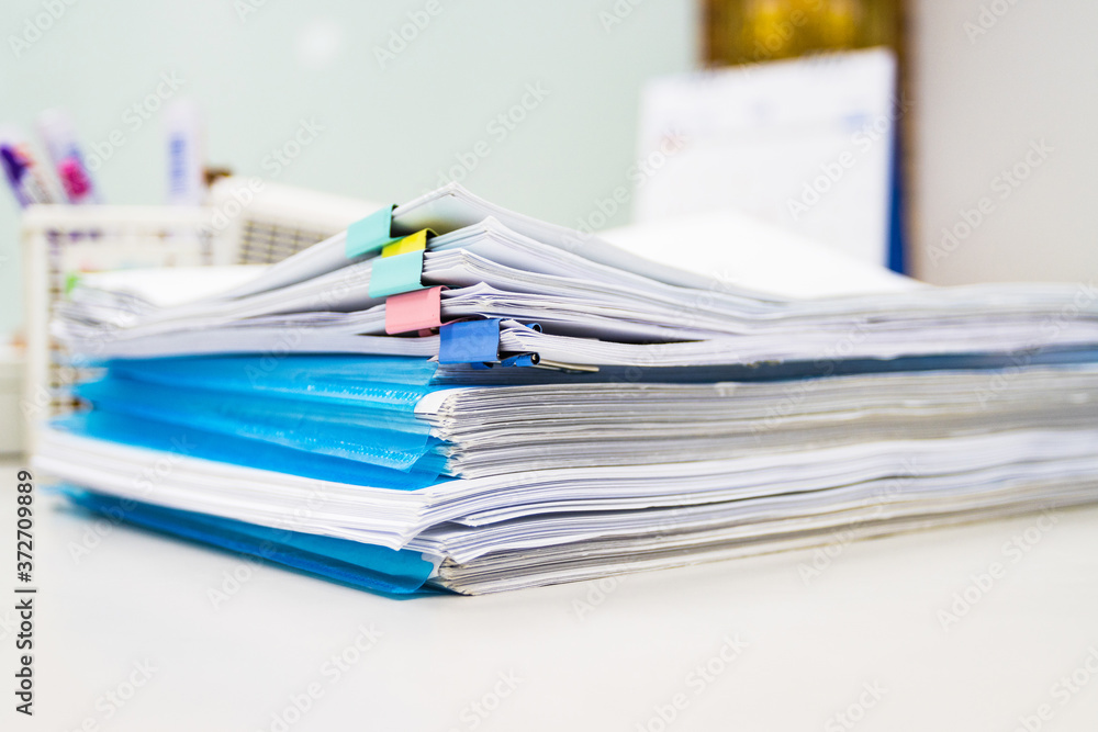 file folder and Stack of business report paper file on the table file folder and Stack of business report paper file on the table