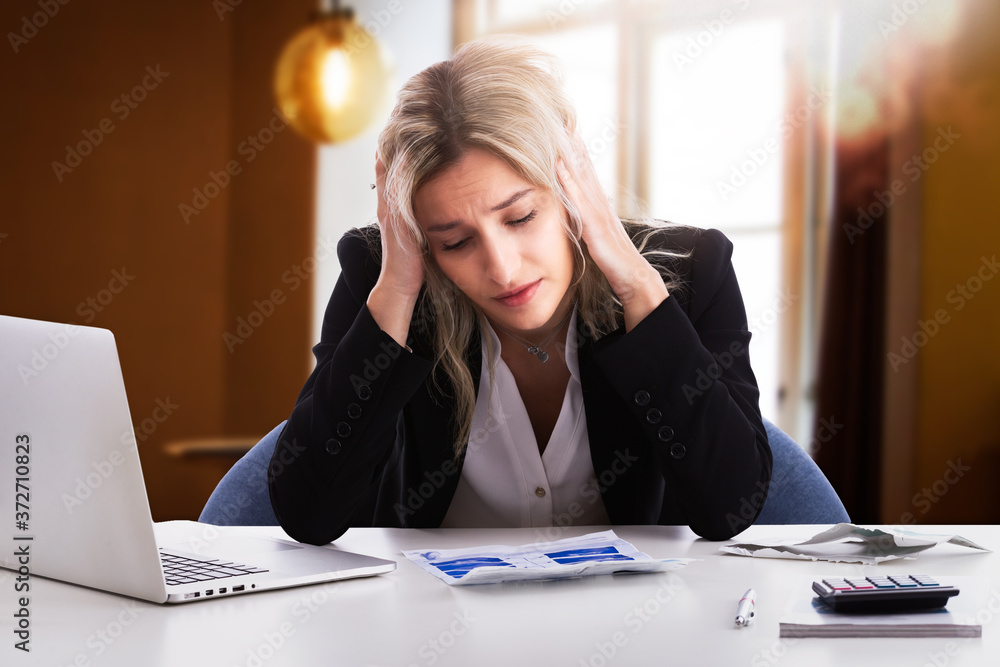 Shot of stressed young woman looking at paper document, bank debt notification, thinking of financial troubles. Lost in negative thoughts depressed woman worrying about bad news notice. Shot of stressed young woman looking at paper document, bank debt notification, thinking of financial troubles. Lost in negative thoughts depressed woman worrying about bad news notice.