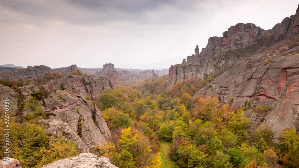 Time lapse with moving clouds at autumn picturesque rock formation, Belogradchik rocks, Bulgaria Time lapse with moving clouds at autumn picturesque rock formation, Belogradchik rocks, Bulgaria