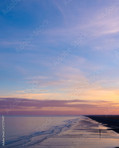 sunrise at onival beach in french normandy photo