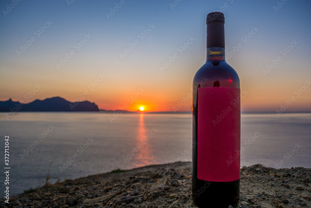 bottle of wine in the background of dawn bottle of wine in the background of dawn