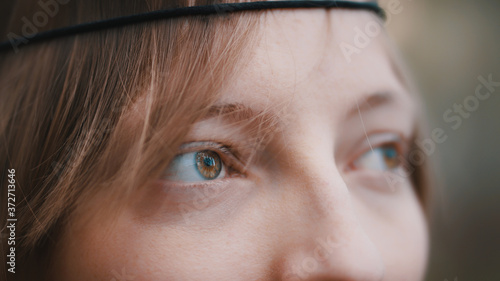 Eyes close up of young hippie woman. High quality photo