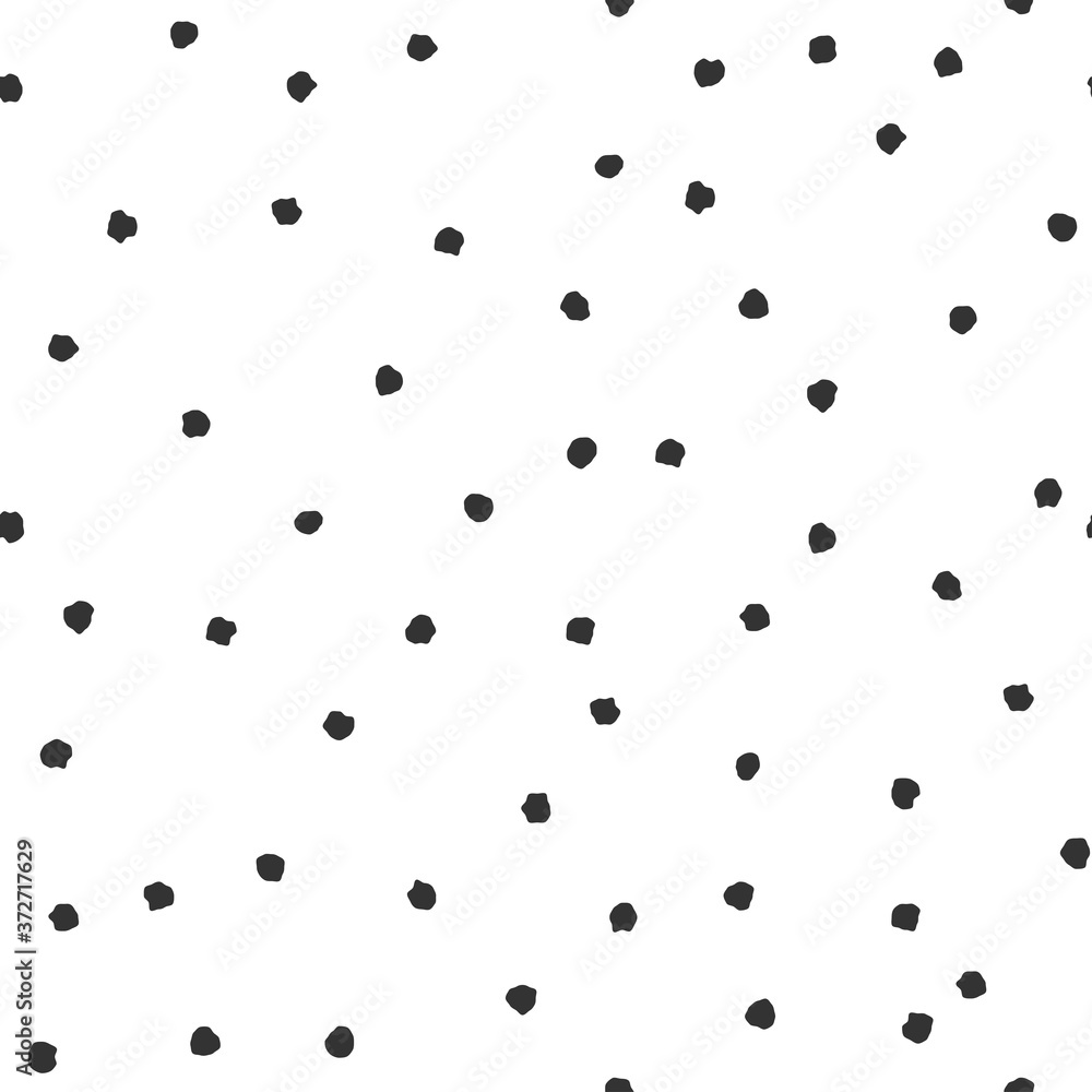 Seamless abstract pattern of little black shabby dots or spots on white.
