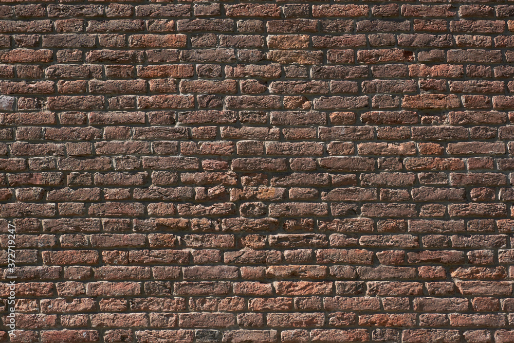 Fototapeta premium Old red and brown brick wall with copy space 