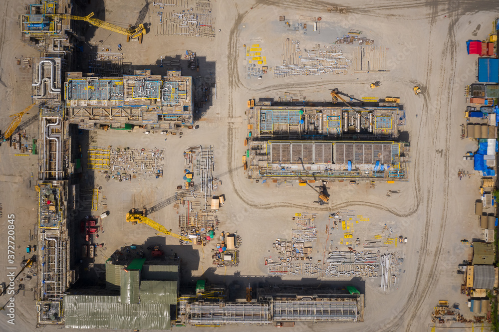 Aerial top view construction site building for new factory area Aerial top view construction site building for new factory area