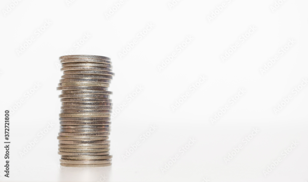 silver coin stack growth up isolated on white background with clipping path. money saving, financial grow, business startup, economy budget and investment concept. silver coin stack growth up isolated on white background with clipping path. money saving, financial grow, business startup, economy budget and investment concept.